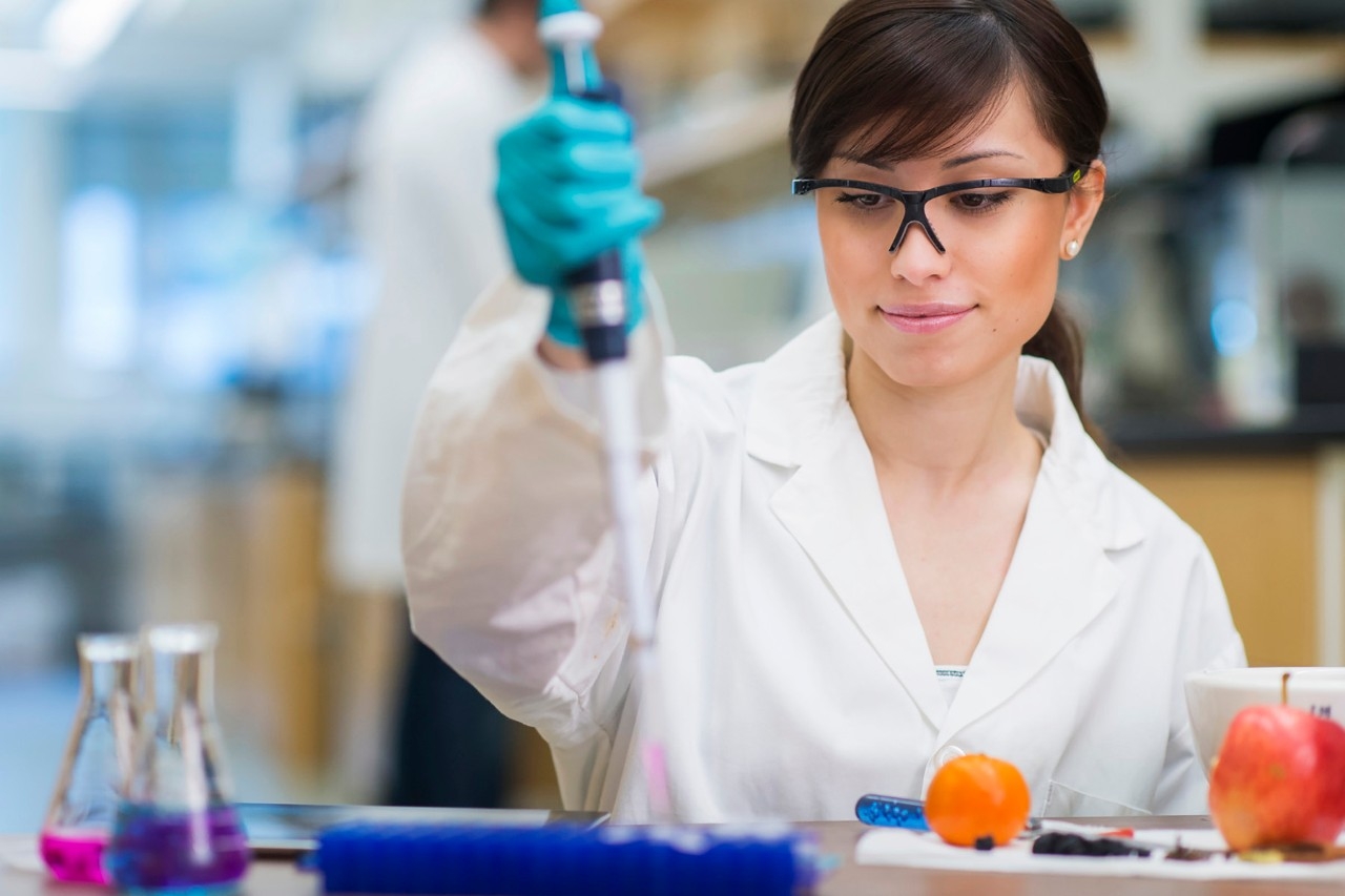 student with pipette